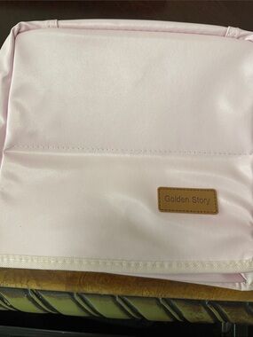 Cosmetic Bag with sections for brushes, cosmetics and zippered compartments